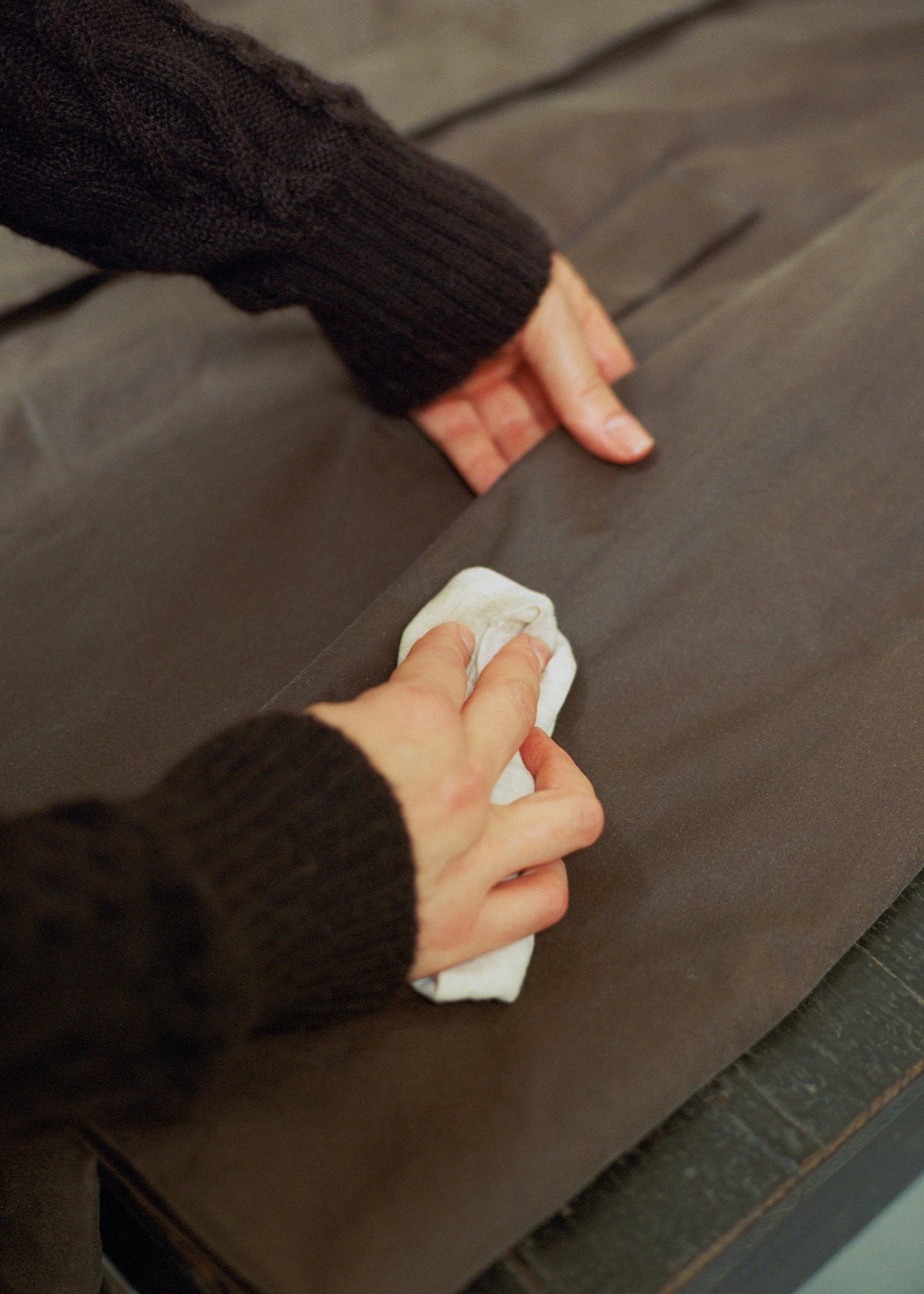 Re-wax oilskin service